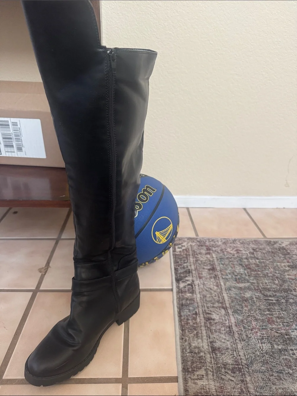 Black Knee-High Women's Riding Boots - Classic Sleek Design